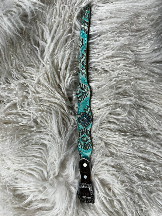 Turquoise Aztec on dark leather